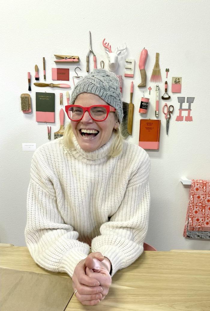 Lisa Congdon smiling in her studio 